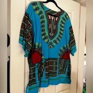 Beautiful cotton shirt! Worn once for a 70’s party. Super comfortable